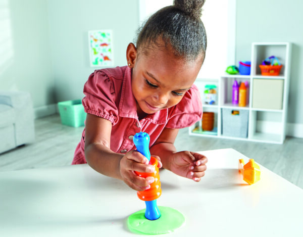 5586 Tactile Tools Girl sh2 cmyk